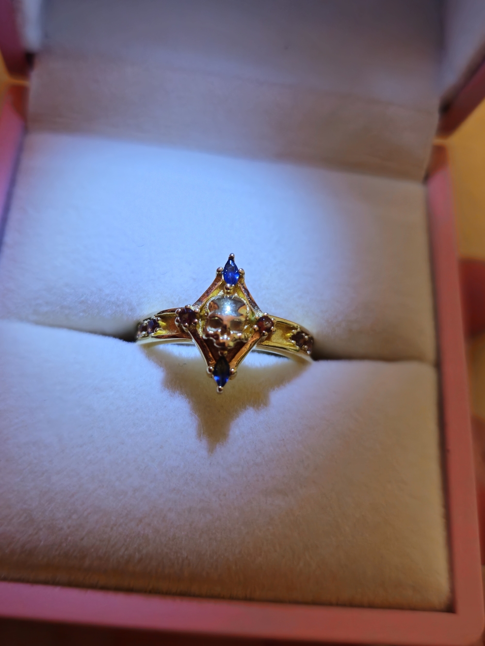 Gold Tone Blue Stone Skull Ring - Bisoulovely RPG Collection